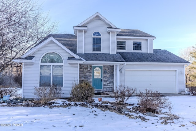 traditional-style home with a garage, stone siding, and a shingled roof