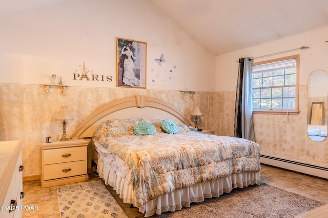 bedroom featuring a wainscoted wall and vaulted ceiling