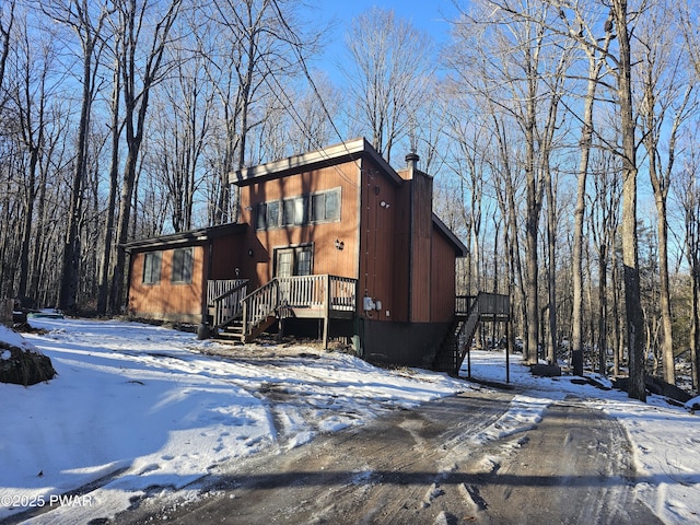 exterior space featuring a wooden deck