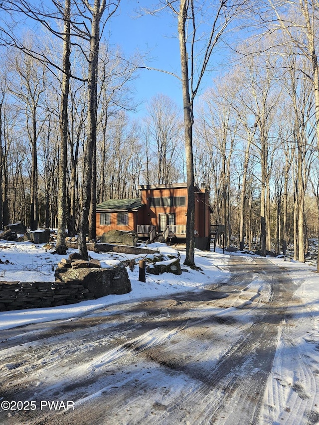 view of front of property featuring a wooden deck