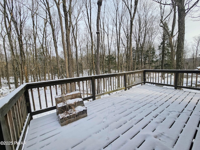 view of snow covered deck