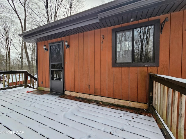 view of snow covered deck