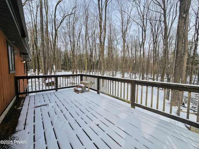 view of snow covered deck