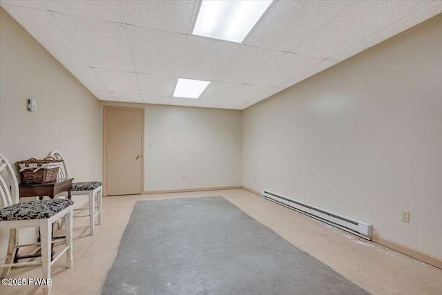 146 Cove Point Cir, Lakeville, PA 18438 - spare room featuring a baseboard heating unit, a drop ceiling, and baseboards