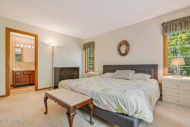 146 Cove Point Cir, Lakeville, PA 18438 - bedroom with light colored carpet, connected bathroom, and baseboards