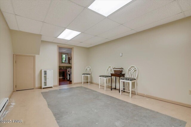 146 Cove Point Cir, Lakeville, PA 18438 - below grade area featuring a drop ceiling and a baseboard heating unit