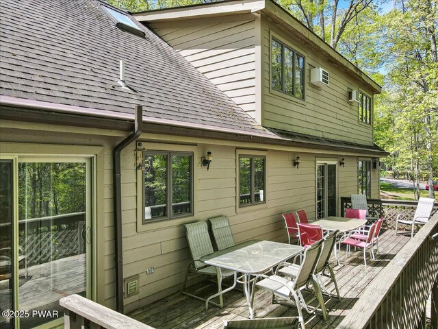 146 Cove Point Cir, Lakeville, PA 18438 - deck featuring outdoor dining area and a wall mounted air conditioner