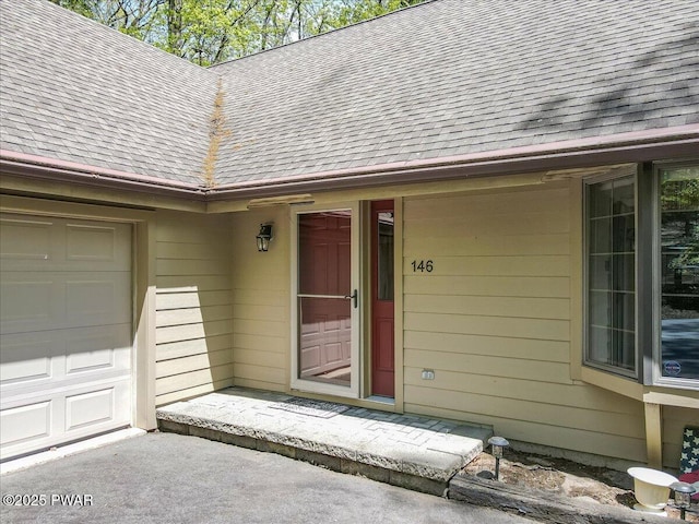 146 Cove Point Cir, Lakeville, PA 18438 - entrance to property with roof with shingles and a garage