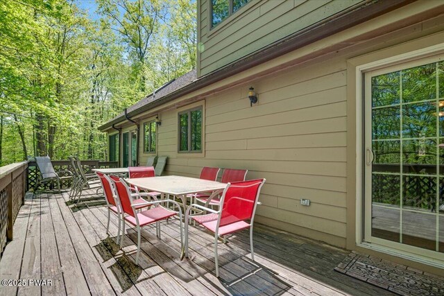 146 Cove Point Cir, Lakeville, PA 18438 - wooden terrace with outdoor dining space