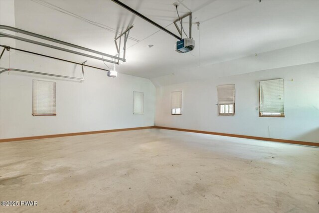 146 Cove Point Cir, Lakeville, PA 18438 - garage with baseboards and a garage door opener
