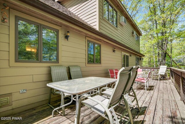 146 Cove Point Cir, Lakeville, PA 18438 - deck featuring outdoor dining area and a wall mounted AC