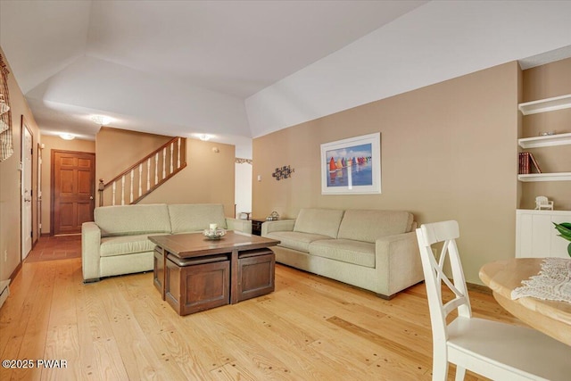 146 Cove Point Cir, Lakeville, PA 18438 - living area featuring light wood-style floors and stairs