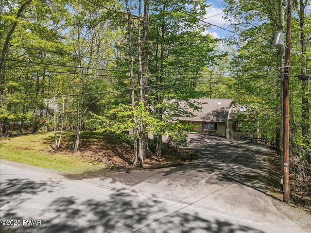146 Cove Point Cir, Lakeville, PA 18438 - view of property hidden behind natural elements featuring driveway
