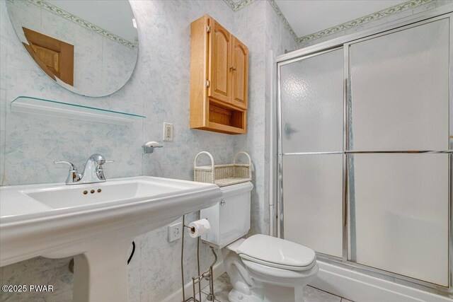 146 Cove Point Cir, Lakeville, PA 18438 - bathroom with toilet, a stall shower, wallpapered walls, and tile patterned flooring