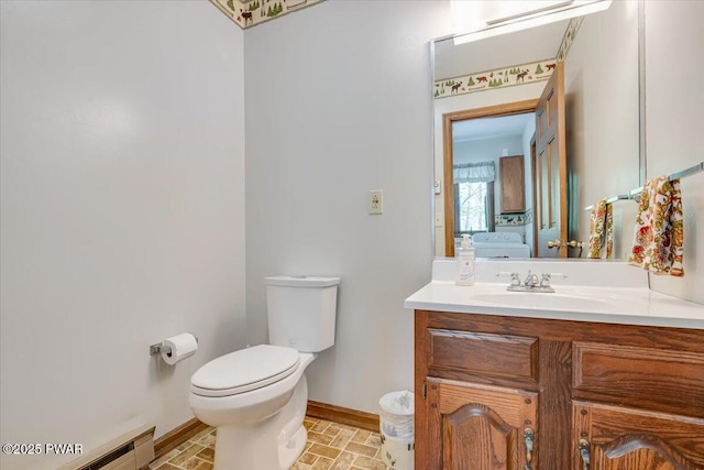 146 Cove Point Cir, Lakeville, PA 18438 - bathroom featuring baseboards, ensuite bath, toilet, vanity, and brick patterned floors