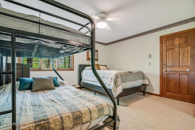 146 Cove Point Cir, Lakeville, PA 18438 - bedroom featuring carpet flooring, baseboards, a ceiling fan, ornamental molding, and a textured ceiling
