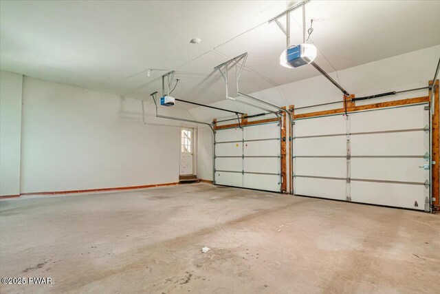 146 Cove Point Cir, Lakeville, PA 18438 - garage featuring a garage door opener