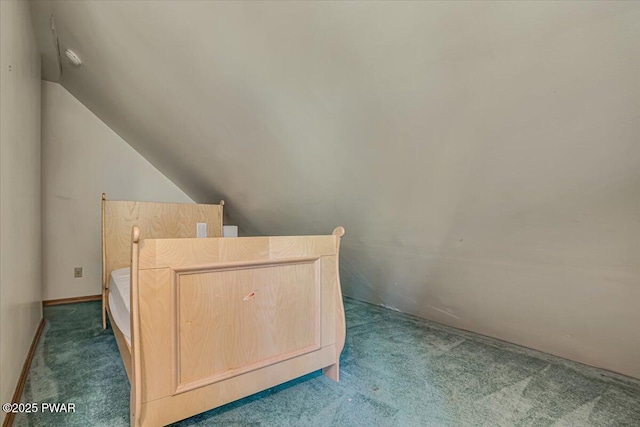 146 Cove Point Cir, Lakeville, PA 18438 - unfurnished bedroom featuring carpet floors and vaulted ceiling