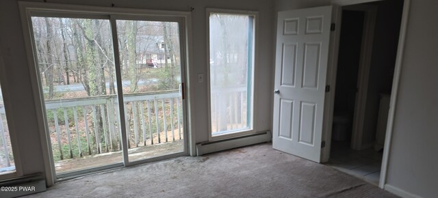 171 Flatbrook Way, Milford, PA 18337 - unfurnished bedroom with access to exterior, carpet flooring, and a baseboard heating unit