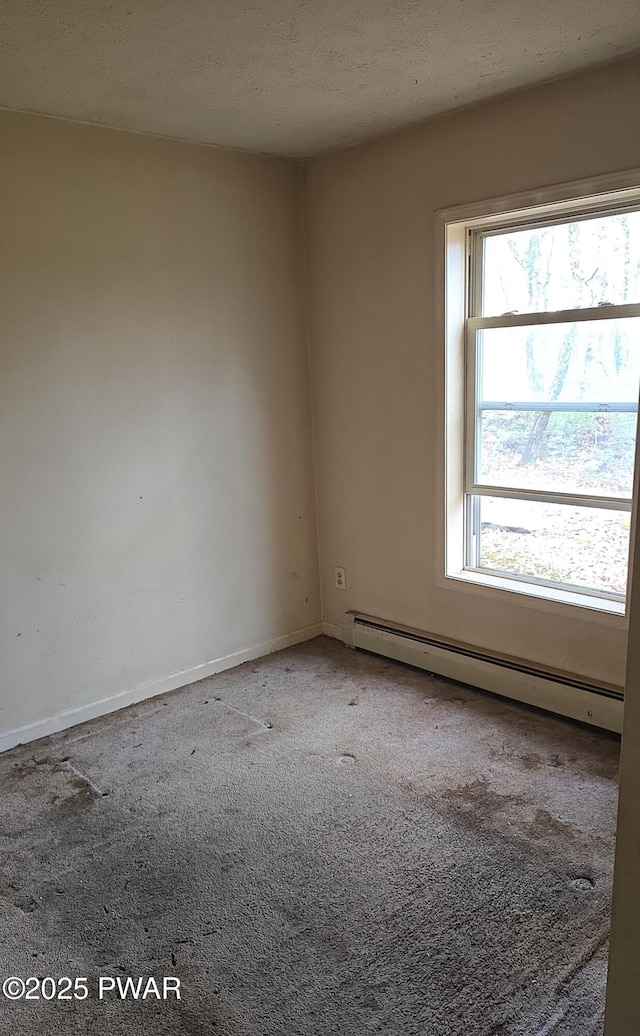 171 Flatbrook Way, Milford, PA 18337 - unfurnished room featuring a textured ceiling, a baseboard heating unit, baseboards, and carpet
