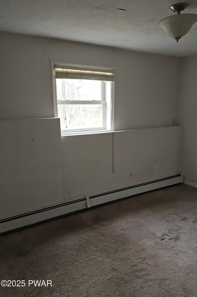 171 Flatbrook Way, Milford, PA 18337 - carpeted spare room featuring a textured ceiling and a baseboard heating unit