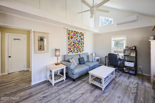 living room featuring high vaulted ceiling, an AC wall unit, a ceiling fan, wood finished floors, and baseboards