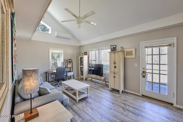 living room featuring baseboards, wood finished floors, high vaulted ceiling, a wall mounted AC, and a ceiling fan