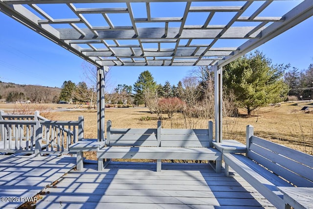 wooden deck featuring a pergola