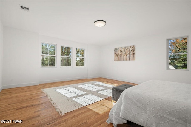 bedroom with light wood-type flooring