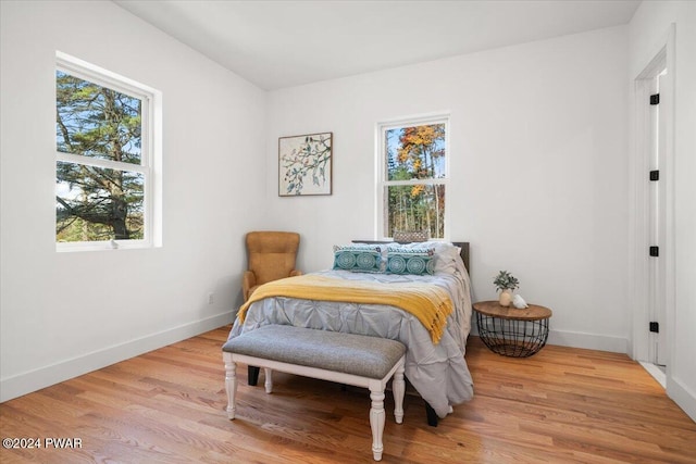 bedroom with light hardwood / wood-style flooring