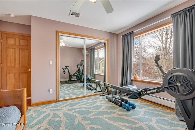 workout area with ceiling fan