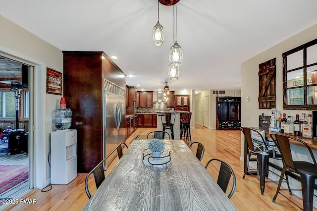 dining room featuring light wood-style floors