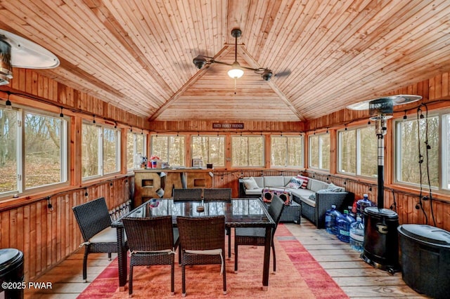 sunroom / solarium with lofted ceiling and wooden ceiling