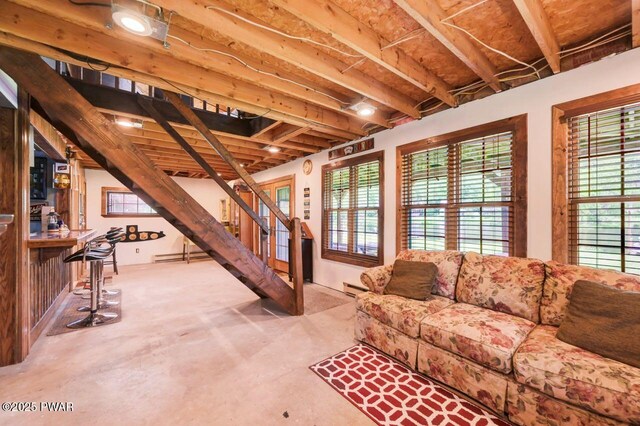 29 Tanglewood Ln, Lake Ariel, PA 18436 - living area with stairs, baseboard heating, and concrete floors