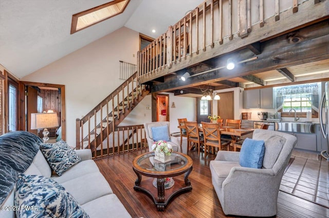 29 Tanglewood Ln, Lake Ariel, PA 18436 - living area featuring lofted ceiling, stairs, a skylight, and wood finished floors