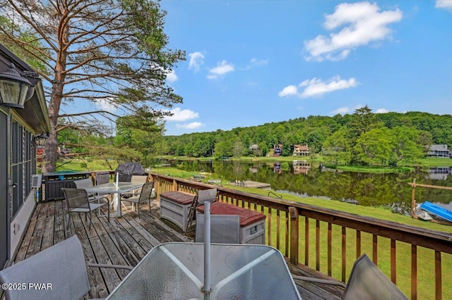 29 Tanglewood Ln, Lake Ariel, PA 18436 - deck featuring outdoor dining space, a water view, a forest view, and a yard
