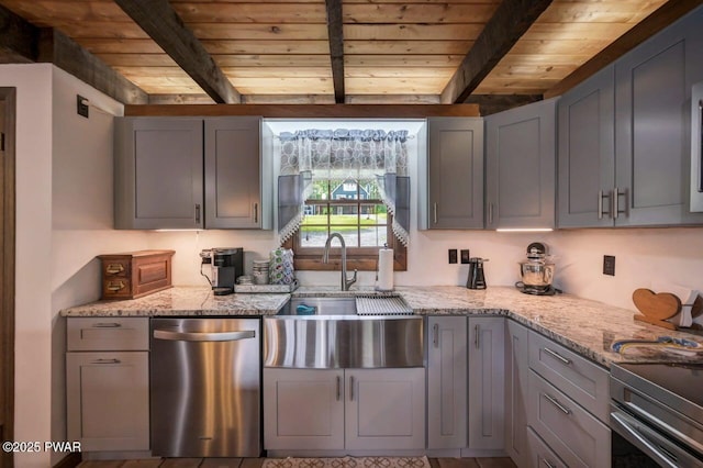 29 Tanglewood Ln, Lake Ariel, PA 18436 - kitchen featuring appliances with stainless steel finishes, a wood ceiling with exposed beams, light stone counters, and gray cabinetry