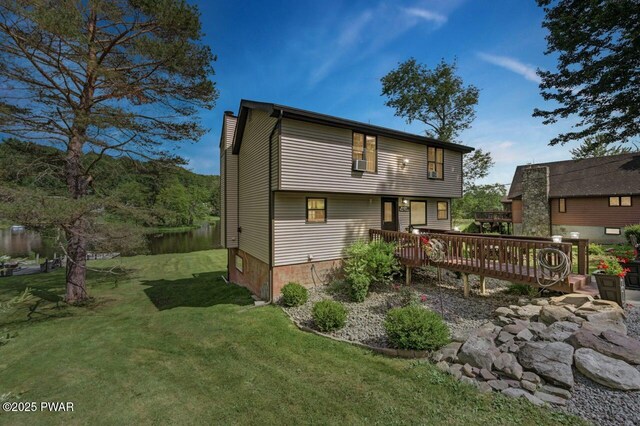 29 Tanglewood Ln, Lake Ariel, PA 18436 - rear view of property featuring a chimney, a deck, a lawn, and cooling unit