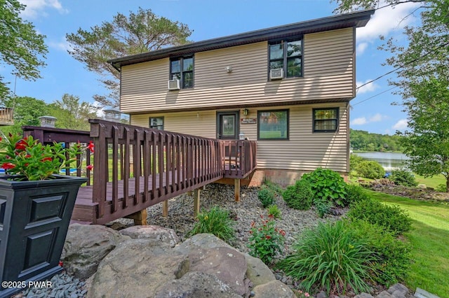 29 Tanglewood Ln, Lake Ariel, PA 18436 - rear view of house with a deck with water view and cooling unit