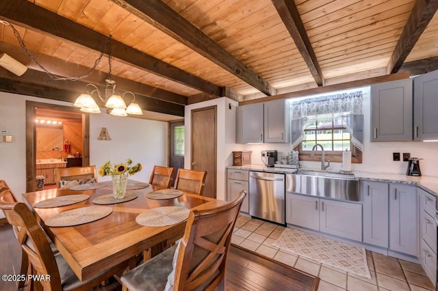 29 Tanglewood Ln, Lake Ariel, PA 18436 - dining area featuring a chandelier, a wood ceiling with exposed beams, and light tile patterned floors