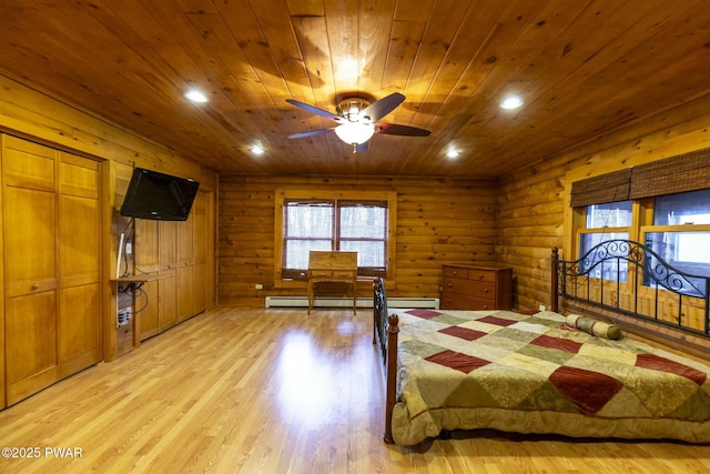 bedroom featuring wooden ceiling, light hardwood / wood-style flooring, ceiling fan, baseboard heating, and log walls