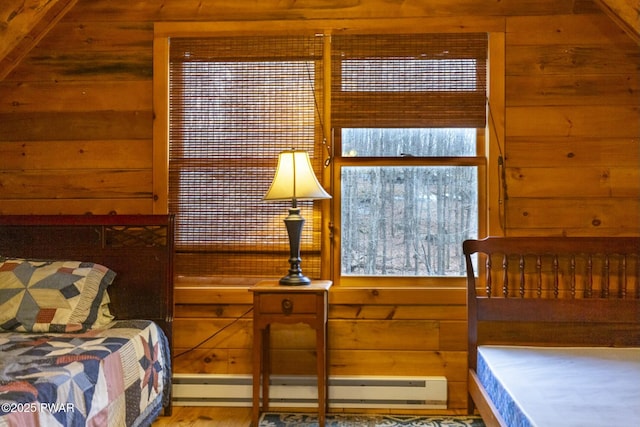 bedroom featuring wooden walls