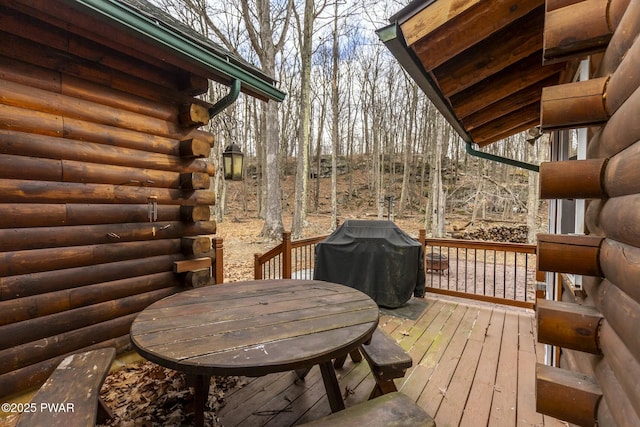 wooden deck with area for grilling