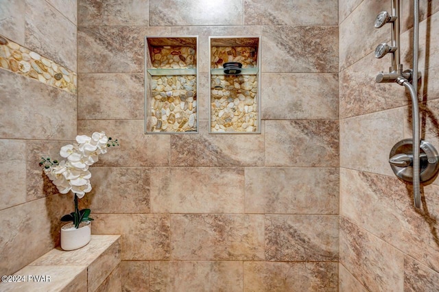 room details with a tile shower