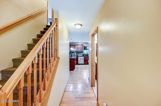 hallway featuring light hardwood / wood-style floors