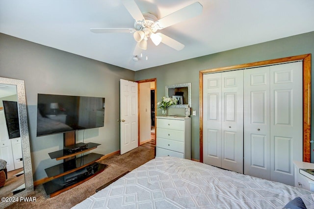 bedroom featuring carpet, ceiling fan, and a closet