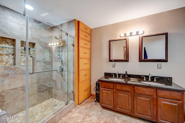 bathroom with vanity and walk in shower