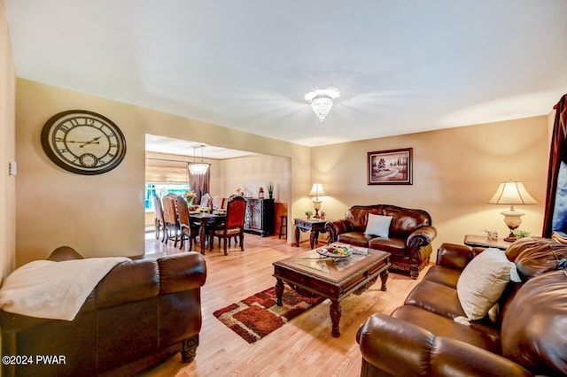 living room with light hardwood / wood-style flooring