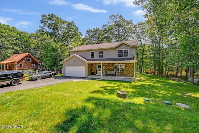 view of property with a front lawn and covered porch