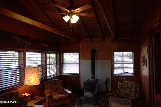 123 Mosier Rd, Dingmans Ferry, PA 18328 - sitting room featuring a wood stove, wooden walls, and wooden ceiling
